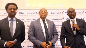 L-R, Country Director, Visa West Africa, Ade Ashaye, GMD, Interswitch, Mitchell Elegbe and DCEO, Switching and Processing, Interswitch